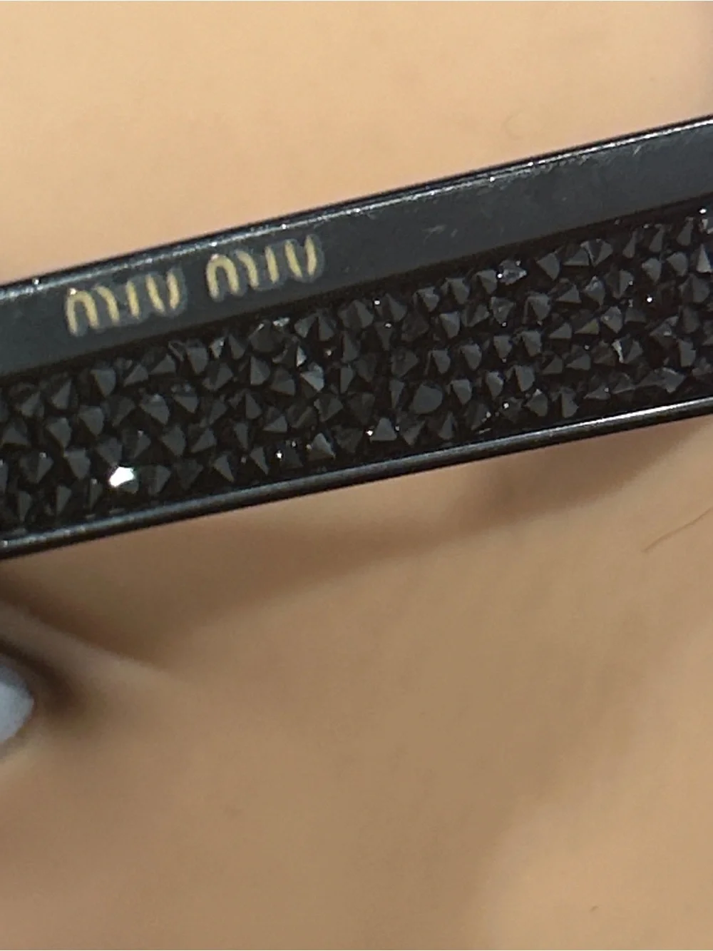 Miu Miu Black Cat-Eye Sunglasses with Dark Lenses